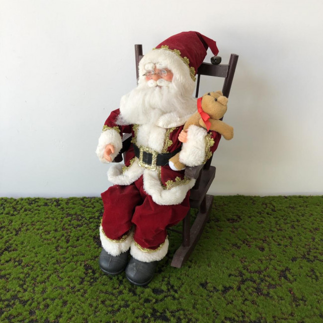 Papai Noel na cadeira de balanço Natal