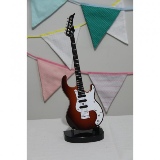 Mini guitarra (now United)