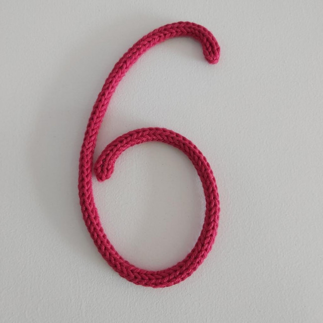 Numero 6 ou 9 tricotin fucsia