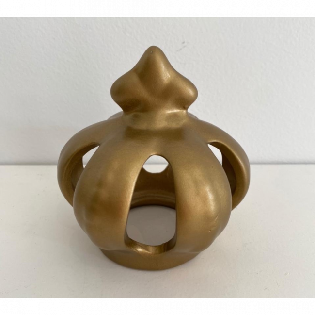 coroa de ceramica dourada